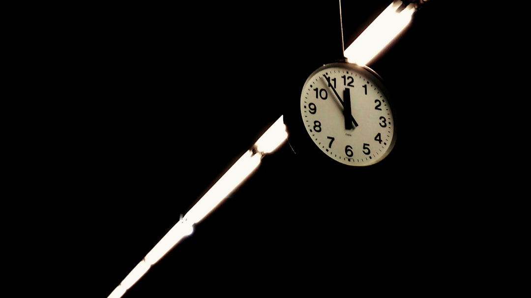 Photo gravitational time delay